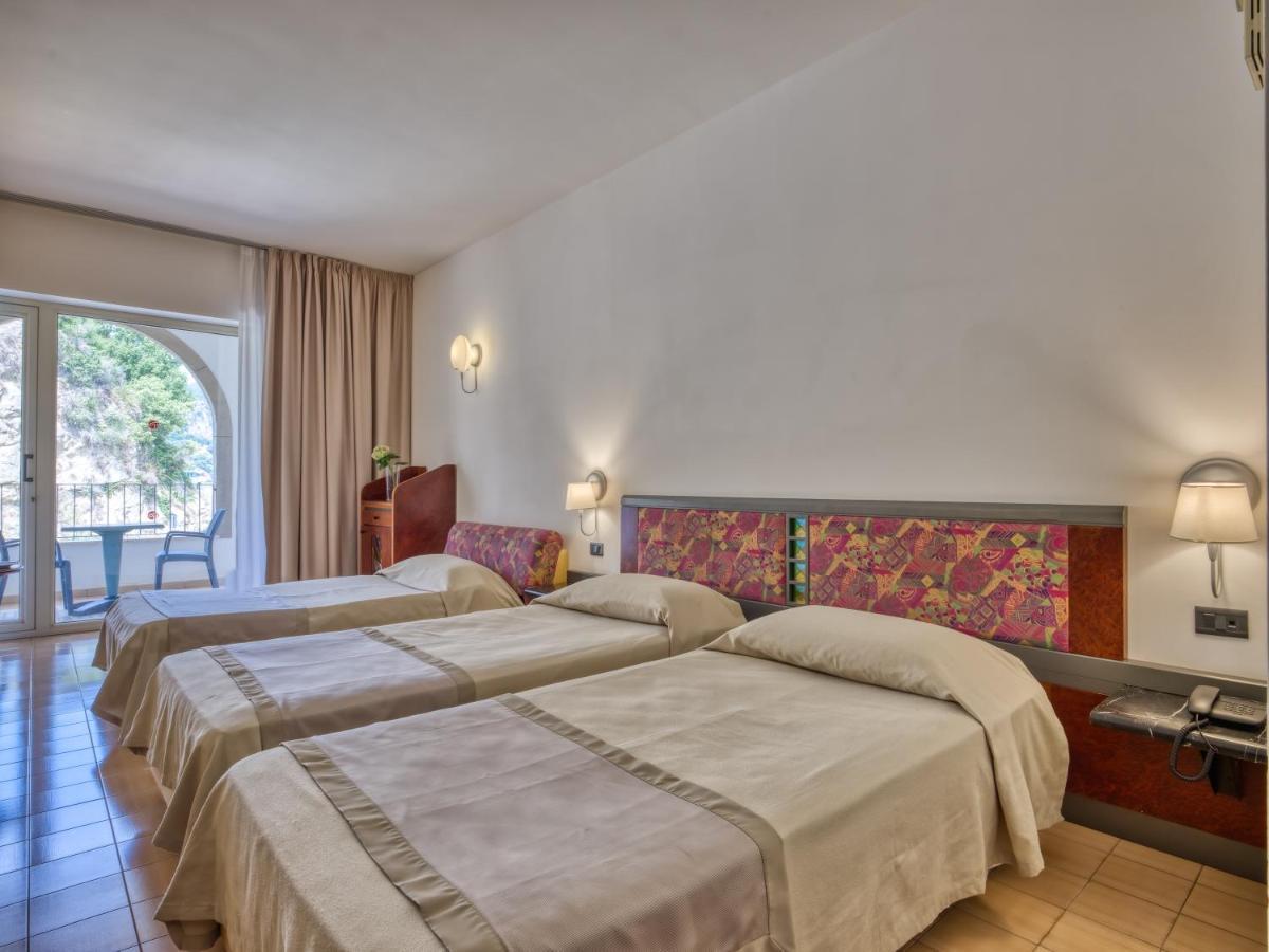 Hotel Olimpo Le Terrazze 勒托阳尼 外观 照片