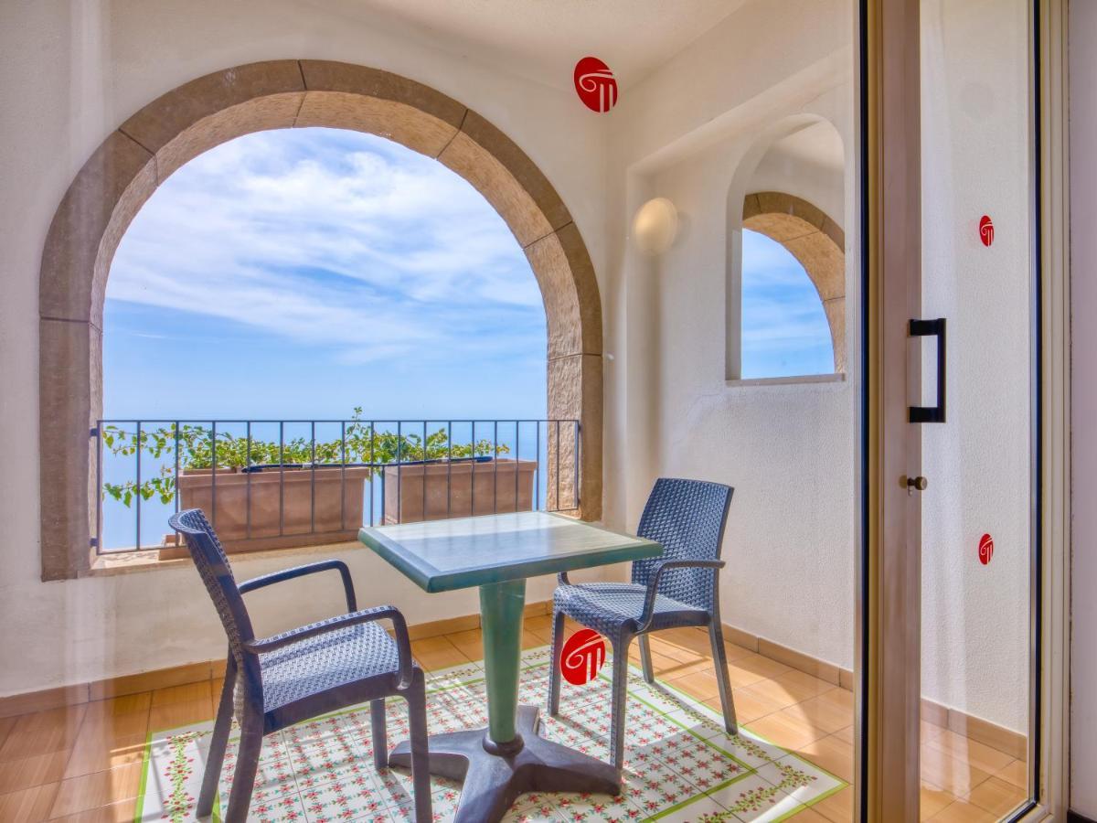 Hotel Olimpo Le Terrazze 勒托阳尼 外观 照片